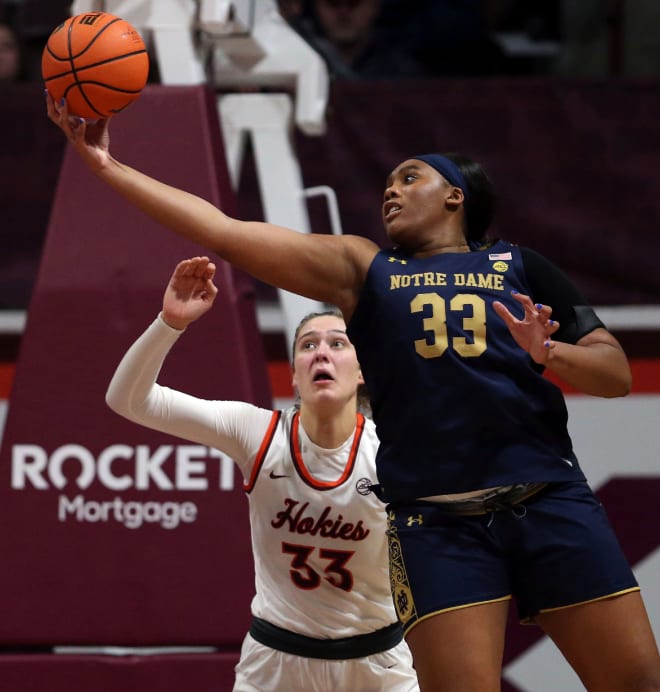 Notre Dame's Lauren Ebo, right, grabs an offensive rebound in front of Virginia Tech's Elizabeth Kitley.