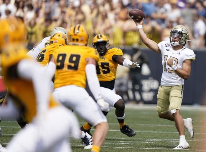 Yates set a record for a first-time starting quarterback at Georgia Tech with four touchdown tosses
