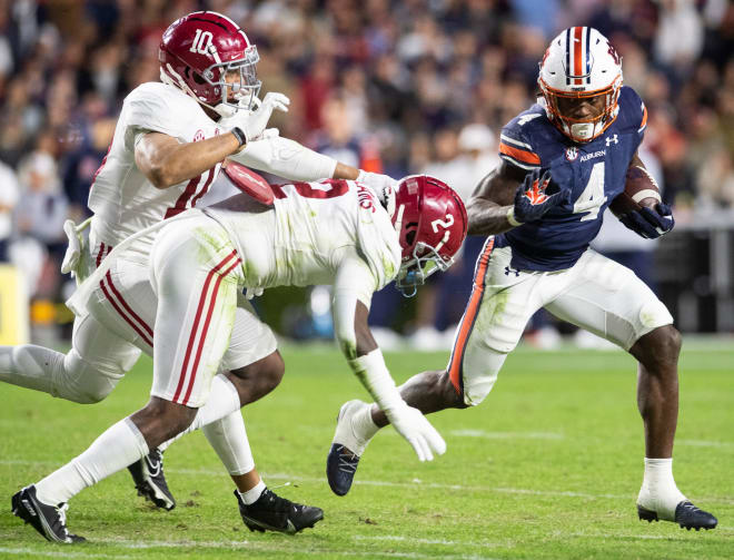 Auburn Tigers running back Tank Bigsby (4) runs the ball during the Iron Bowl at Jordan-Hare Stadium in Auburn, Ala., on Saturday, Nov. 27, 2021. Photo | Jake Crandall / USA TODAY NETWORK