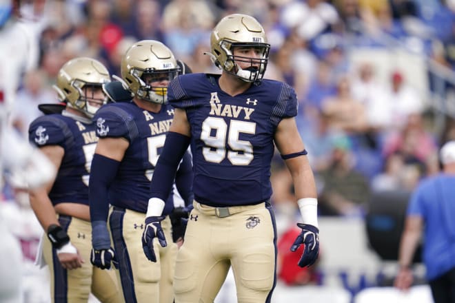 Navy defensive end Jacob Busic (95) looks on between plays against SMU during the first half of an NCAA college football game, Saturday, Oct. 9, 2021, in Annapolis, Md. (AP Photo/Julio Cortez)