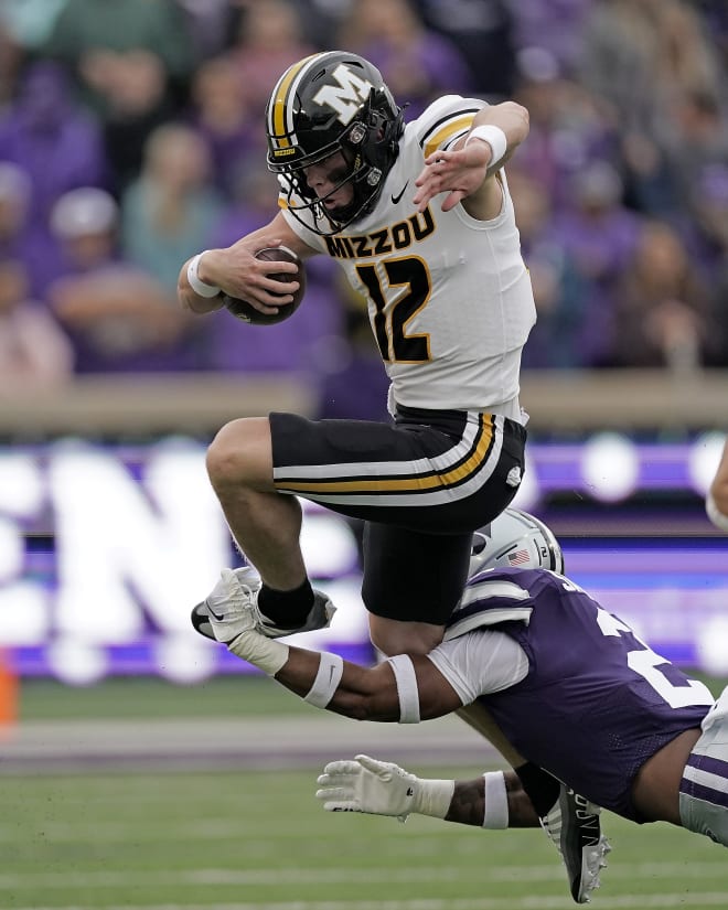 Kobe Savage tackles Missouri QB Brady Cook in Manhattan during 2022's game