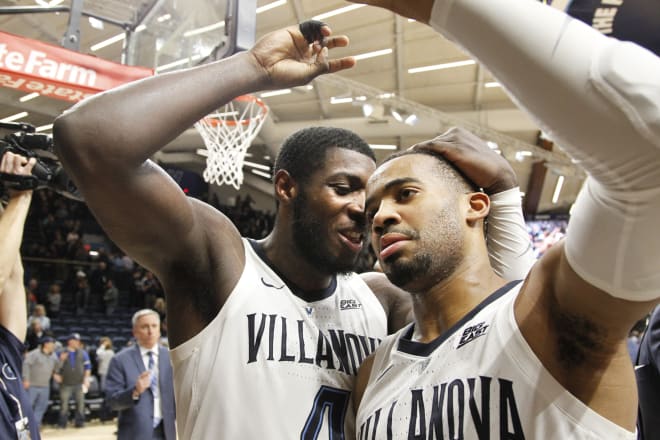 Villanova's Eric Paschall (left) and Phil Booth