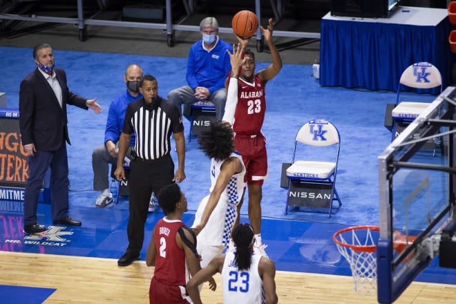 Alabama Crimson Tide guard John Petty Jr. (23) shoots a three-pointer against Kentucky Wildcats guard Brandon Boston Jr. (3) during the first half at Rupp Arena at Central Bank Center. Photo | Imagn