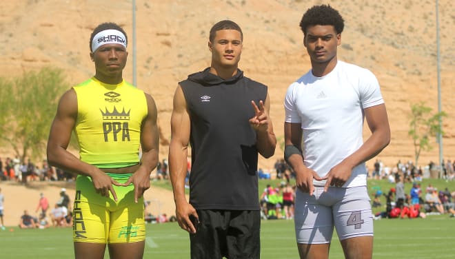 Michigan Wolverines Football Recruiting commits Kody Jones and Will Johnson pose with five-star target Domani Jackson. 