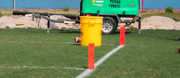 Quarterbacks just missed 30-yard corner throws into the trash can.