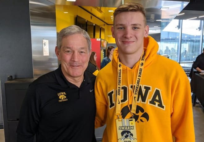 Class of 2021 in-state tight end Tyler Moore with head coach Kirk Ferentz at Iowa's junior day.