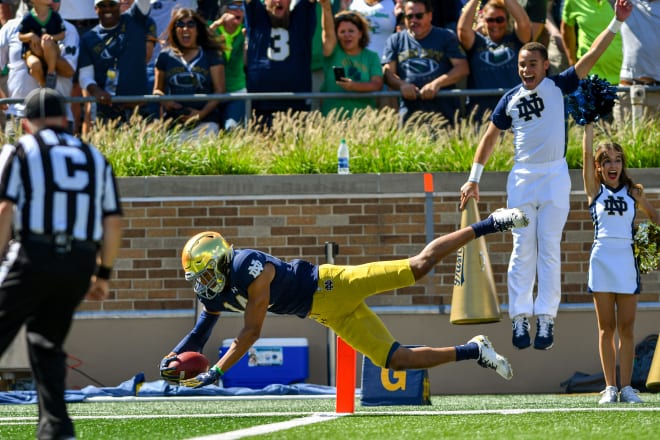 Notre Dame freshman safety Kyle Hamilton, seen here scoring a touchdown in his first career game at Notre Dame Stadium, is living up to his recruiting hype.