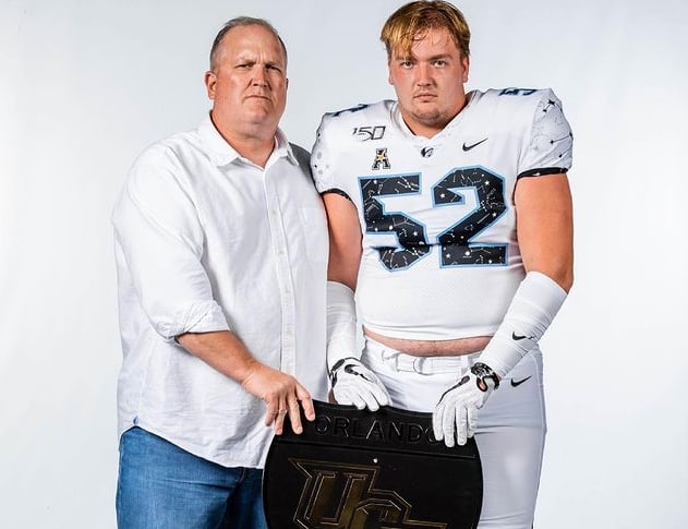 Caden Kitler and offensive line coach Herb Hand. 