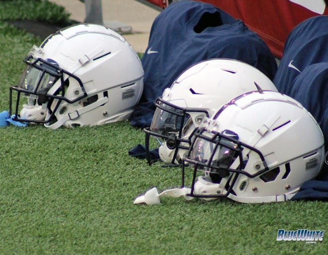 Penn State helmets sit waiting to be worn during pregame warmups at Wisconsin. BWI photo/Greg Pickel