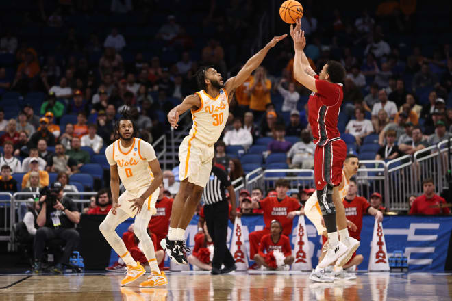Tennessee guard Josiah-Jordan James (30) goes up to defend a shot against Louisiana on Thursday.