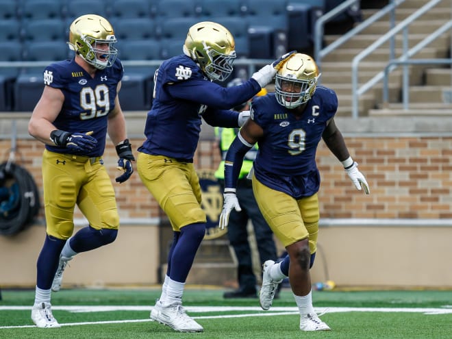 Daelin Hayes (9) and the entire defense rose to the occasion in the 12-7 win versus Louisville.