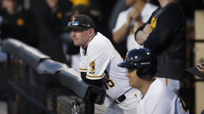 Iowa assistant head coach Marty Sutherland runs down the Hawkeye baseball newcomers. 