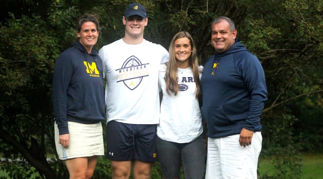 The Martin family was all smiles after Tyler's commitment to Michigan. 