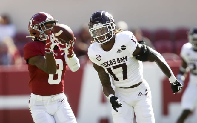 Alabama wide receiver John Metchie III (8) makes a catch and runs for a touchdown with Texas A&M defensive back Jaylon Jones (17) pursuing at Bryant-Denny Stadium. Photo | Imagn