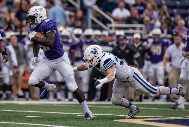 James Madison running back Percy Agyei-Obese (31) runs past a Villanova defender during the Dukes' win over the Wildcast last year at Bridgeforth Stadium.