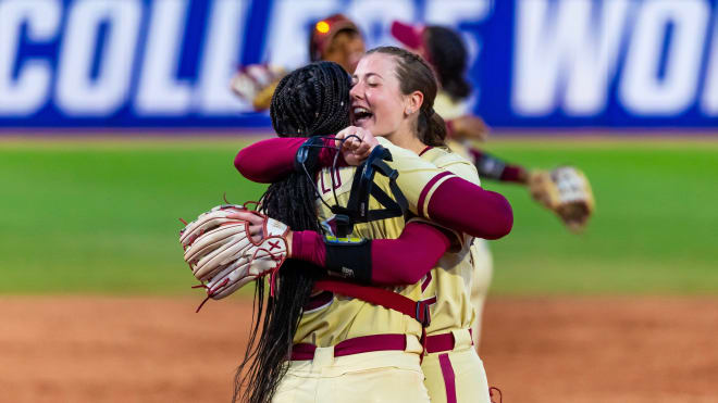 Michaela Edenfield and Kathryn Sandercock celebrate the Seminoles' win over Tennessee on Monday.