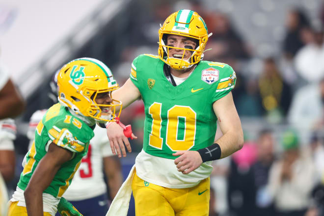 Quarterback Bo Nix and wide receiver Tez Johnson connected for 11 completions for 172 yards and a touchdown in the Fiesta Bowl on Monday.