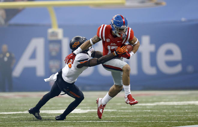 Ole Miss tight end Evan Engram hauls in a first-quarter pass in the Sugar Bowl. Engram caught six passes for 96 yards in the win over the Cowboys.
