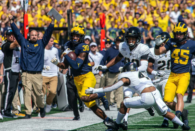 Michigan Wolverines football freshman safety Daxton Hill hauled in his first-ever reception on a fake punt in the second quarter.