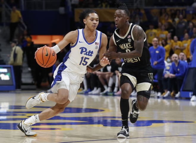 Pitt guard Jaland Lowe drives against Wake Forest's Kevin Miller on Wednesday night. 