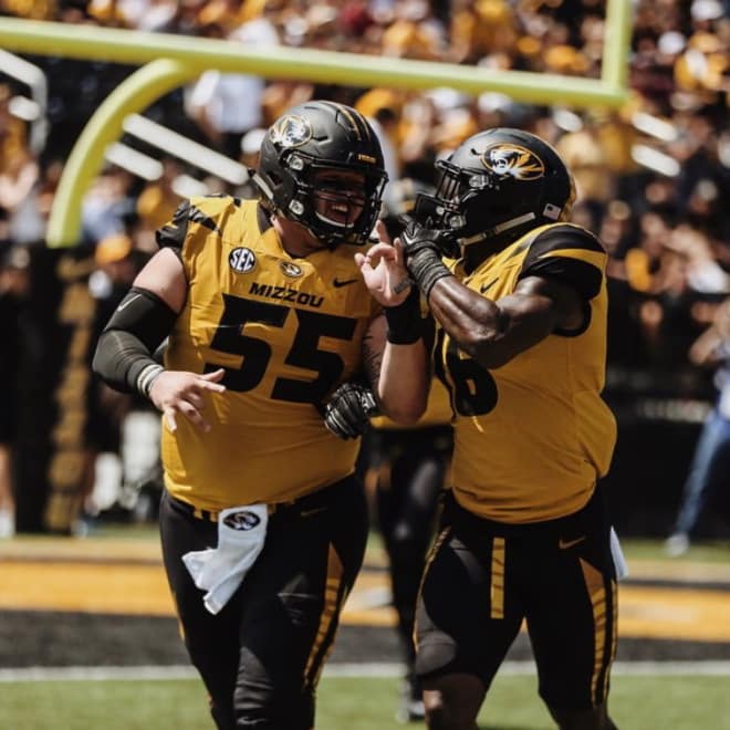 Castillo celebrated a touchdown with Damarea Crockett during Saturday's win