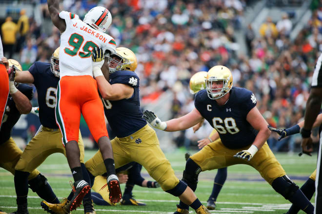 Mike McGlinchey (right) spoke about the impact the NCAA's penalty has on the current team.
