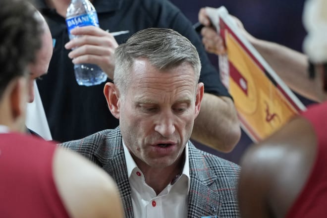 Alabama Crimson Tide head coach Nate Oats talks to players during a timeout against the Connecticut Huskies in the semifinals of the men's Final Four of the 2024 NCAA Tournament at State Farm Stadium. Photo | Bob Donnan-USA TODAY Sports
