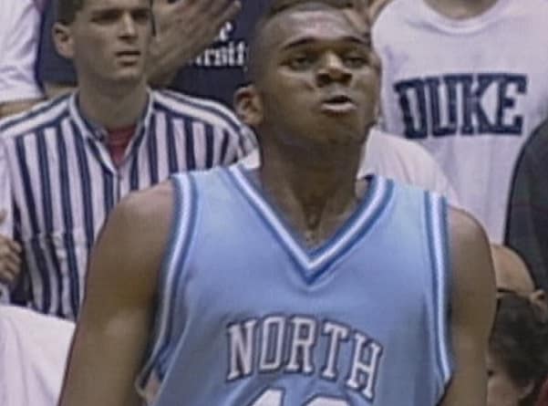 Jerry Stackhouse struts after ramming home an amazing reverse dunk in a win at Duke in 1995. 