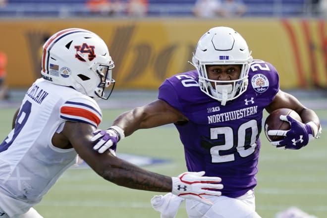Running back Cam Porter is one of the few seniors this season that contributed to Northwestern's last winning season in 2020