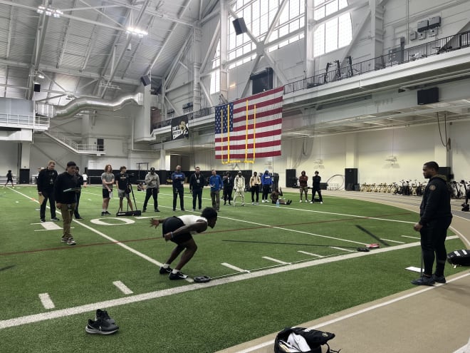 Kavosiey Smoke doing the broad jump at Colorado's pro day.