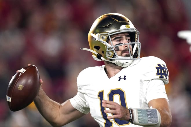 Pyne completed 22 touchdown passes and 64.6% of his passes overall. That 8-2 record included a 4-1 record against Top 25 teams (AP Photo/Mark J. Terrill)