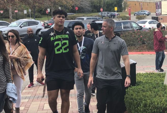 FSU head coach Mike Norvell chats with 5-star offensive tackle Julian Armella during his weekend visit.