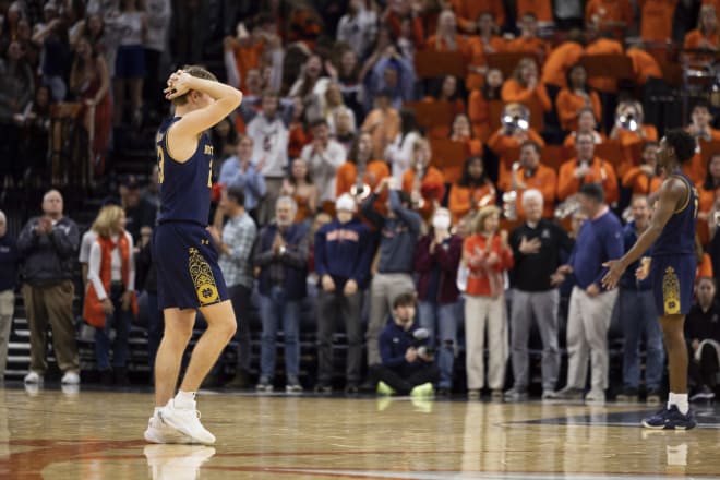 Notre Dame's Dane Goodwin (23) throws up his hands after missing the potential game-winning shot at the buzzer in a 57-55 loss at Virginia on Saturday.