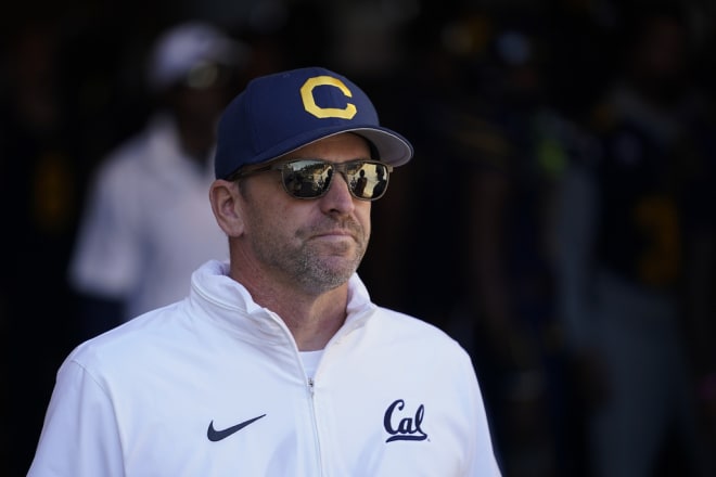 Justin Wilcox looks on from the tunnel during Cal's final home game recently.