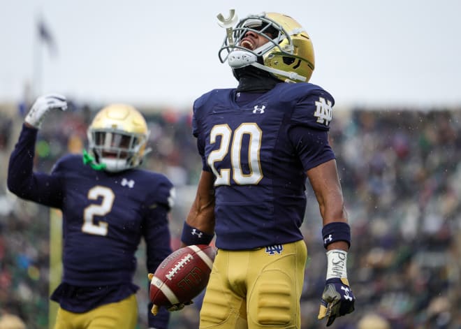 Notre Dame freshman Benjamin Morrison (20) celebrates one of his three interceptions against Boston College last Saturday.