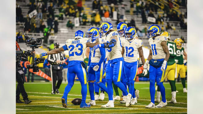 Tyler Higbee celebrating a Cam Akers touchdown on Saturday versus the Packers. (Photo: therams.com)