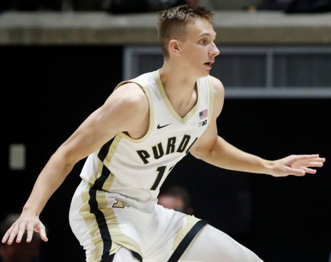 Purdue Boilermakers forward Brian Waddell (11) defends during the men s basketball exhibition game against Grace College, Wednesday, Nov. 1, 2023, at Mackey Arena in West Lafayette, Ind. Purdue Boilermakers won 98-51.