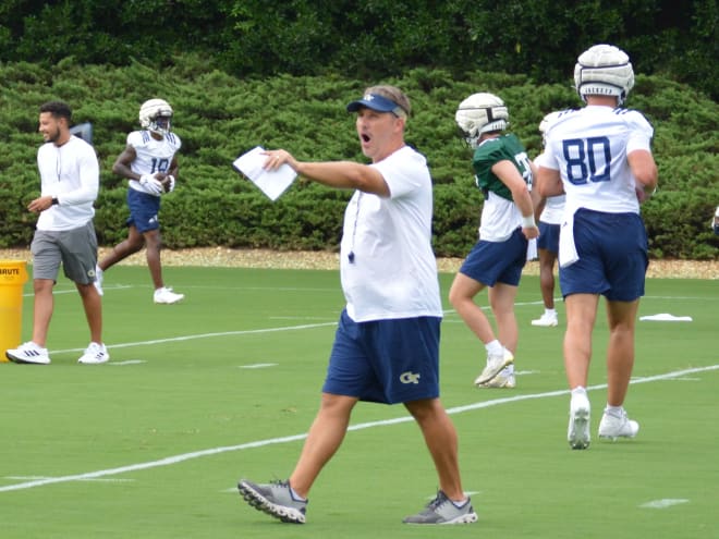 Buster Faulkner giving instructions during practice Wednesday 