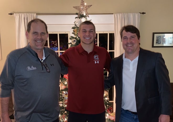 New offensive coordinator Mike Bobo, quarterback commit Luke Doty, and Will Muschamp at the Doty family's home.