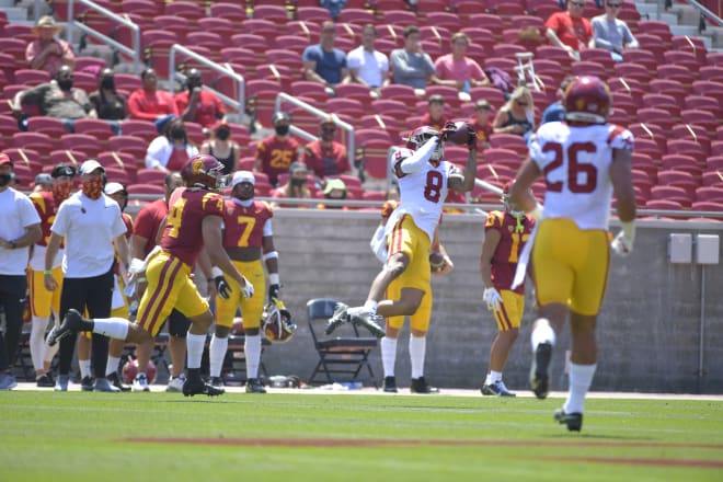 Junior cornerback Chris Steele makes an interception off Moss.