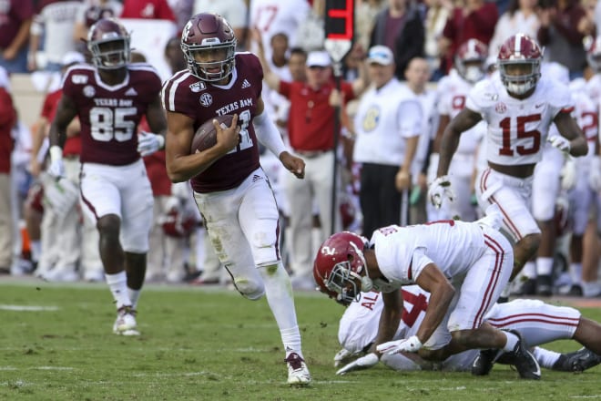 Texas A&M's Kellen Mond breaks a run against Alabama in the Aggies' loss to the. Crimson Tide Saturday in College Station. 