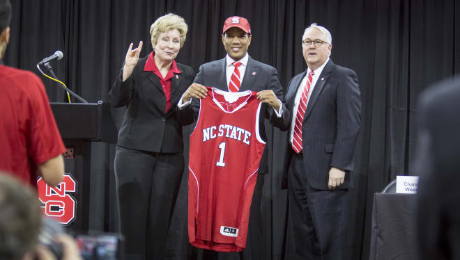 Keatts was introduced by AD Debbie Yow (left) and chancellor Randy Woodson (right).