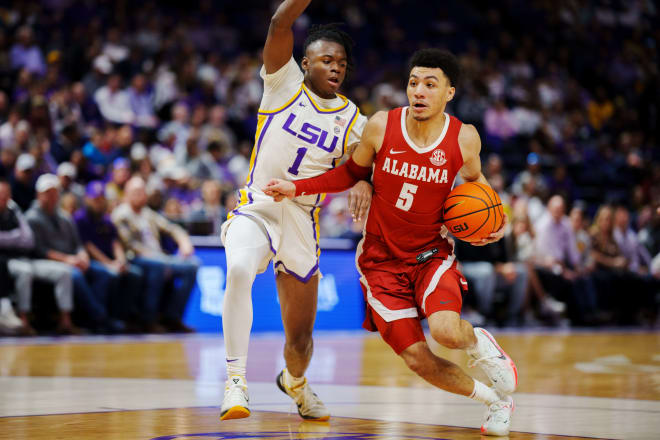 Alabama Crimson Tide guard Jahvon Quinerly (5) drives to the basket against LSU Tigers guard Cam Hayes (1) during the second half at Pete Maravich Assembly Center. Photo | Andrew Wevers-USA TODAY Sports