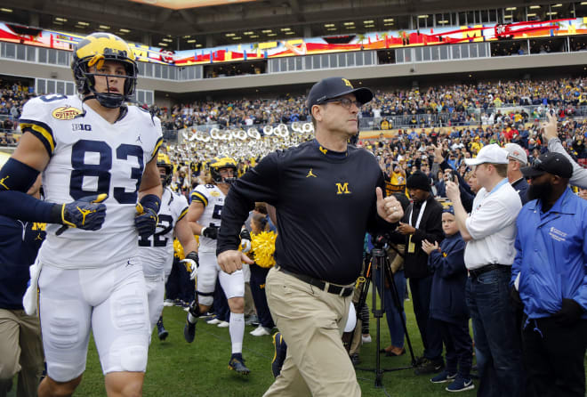 Michigan Wolverines head football coach Jim Harbaugh has won 49 games in six seasons in Ann Arbor.