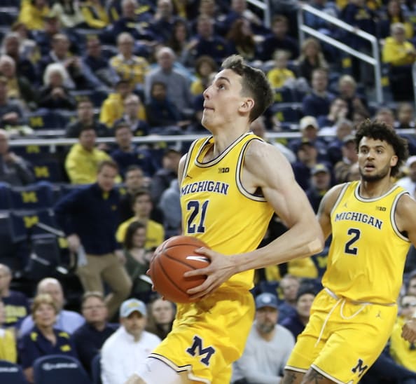 Michigan Wolverines basketball's Franz Wagner (left) and Isaiah Livers