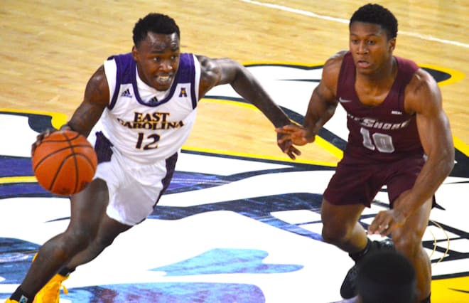 Tremont Robinson-White drives on Maryland-Eastern Shore's Glen Anderson in Tuesday's 71-57 ECU win.