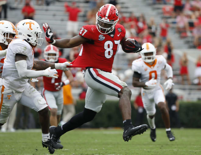 Tre' McKitty runs after the catch during Georgia's win over Tennessee. (Andrew Davis Tucker/UGA Sports Communications)