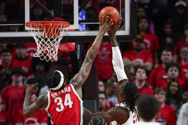 Mar 10, 2024; Piscataway, New Jersey, USA; Ohio State Buckeyes center Felix Okpara (34) blocks a shot by Rutgers Scarlet Knights center Clifford Omoruyi (11) during the first half at Jersey Mike's Arena. 