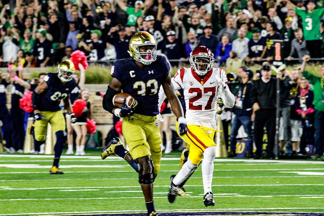 Josh Adams' assault on the Notre Dame record books continued with 191 yards rushing, 84 on this touchdown run.