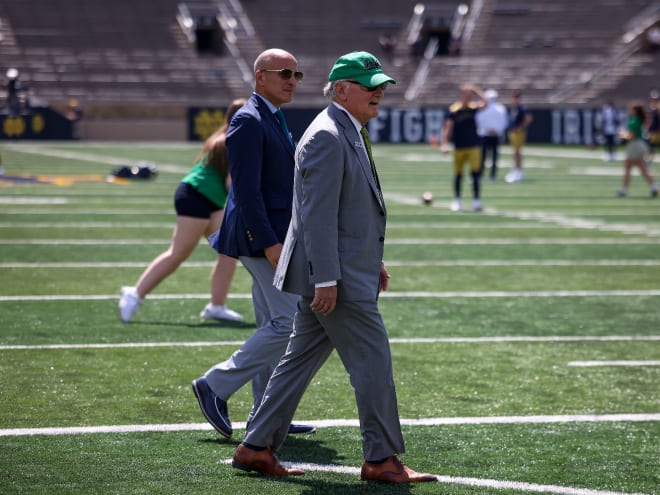 Notre Dame extended its media rights contract with NBC Sports under the leadership of athletic director Jack Swarbrick, front. Future Notre Dame athletic director Pete Bevacqua, back, is the former chairman of NBC Sports. 